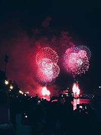 Firework display at night