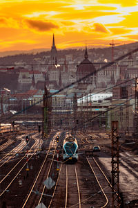 High angle view of traffic on road against sky during sunset