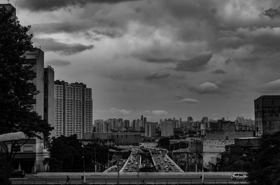 Buildings in city against sky