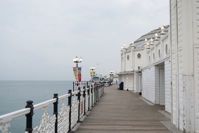 Brighton palace pier over sea against sky