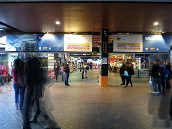 People at railroad station platform