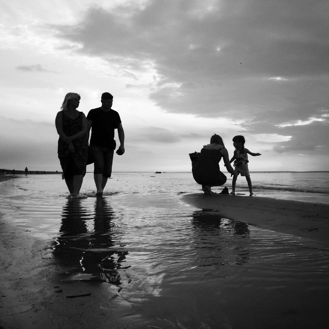 water, sea, beach, lifestyles, leisure activity, togetherness, sky, men, full length, horizon over water, shore, bonding, silhouette, vacations, rear view, person, boys, walking