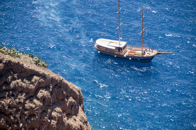 High angle view of sailboat sailing on sea