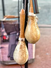 Close-up of metal hanging on table