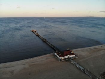 Famous ahlbeck sea bridge, pier at baltic sea, germany at sunset in winter