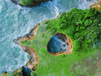 Aerial view of coral beach on the beach. the view of the sea of bengkulu, indonesia. love beach