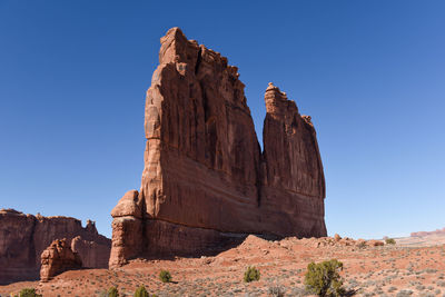 Rock formations against blue sky