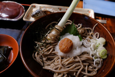 Close-up of noodles in bowl on table