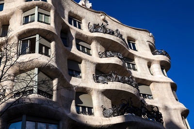 Low angle view of building against blue sky