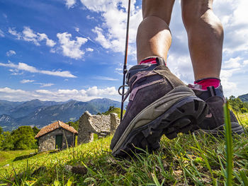 Trekking boots detail in the italian alps