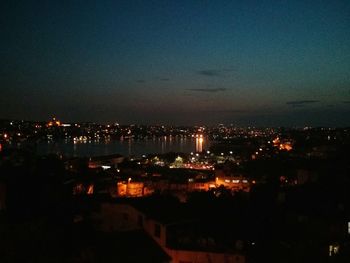 Illuminated cityscape at night