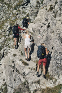 People walking on rocks