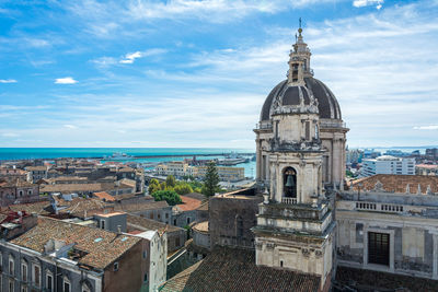 High angle view of city buildings against sky