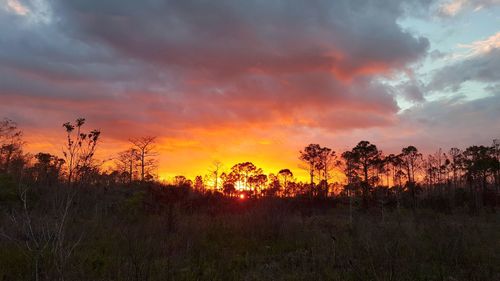 Scenic view of dramatic sky during sunset