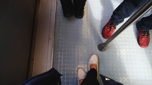 Low section of woman standing on floor