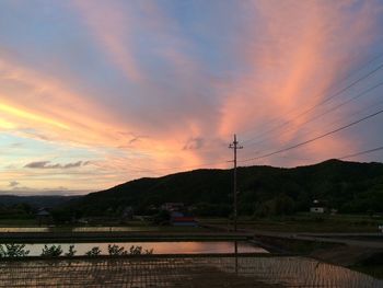 Scenic view of mountains at sunset