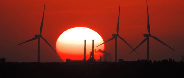 Scenic view of landscape at sunset