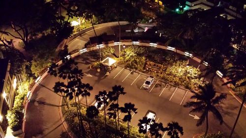 People by swimming pool at night