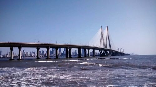 Suspension bridge against clear sky