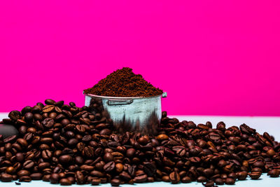 Close-up of coffee beans on table