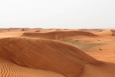 Scenic view of desert against clear sky