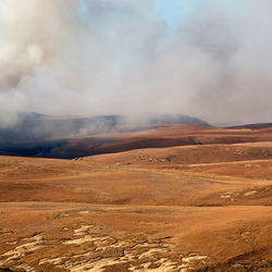 Scenic view of desert against sky