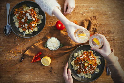High angle view of person preparing food on table