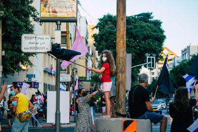 People on street in city