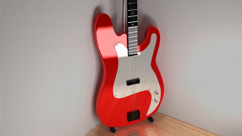 Close-up of guitar against white background
