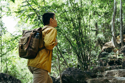 Man standing in forest