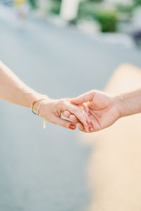 Cropped hand of woman with nail polish