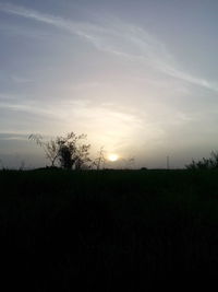 Scenic view of landscape at sunset