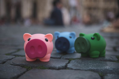 Close-up of toy on footpath