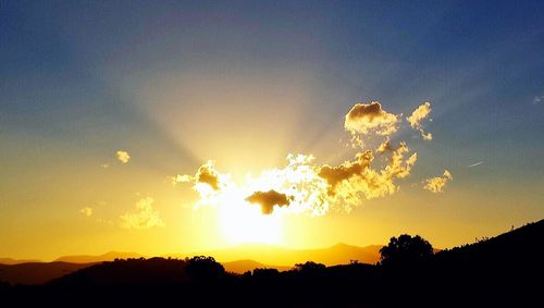 Silhouette of landscape at sunset