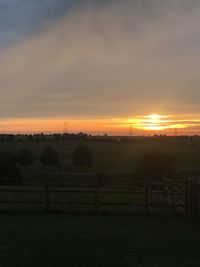 Scenic view of dramatic sky during sunset