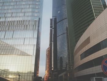 Low angle view of modern buildings against sky