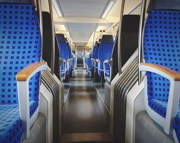 Empty chairs in corridor