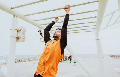 Athlete exercising at beach