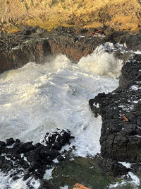 Scenic view of rocks in sea