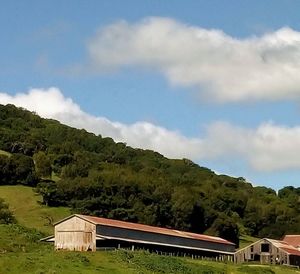 Built structure on mountain against sky