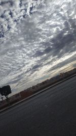 Scenic view of road against sky in city