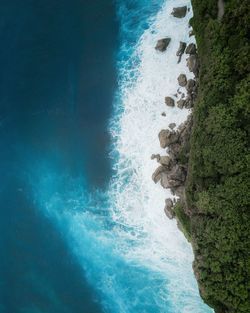 Scenic view of sea against blue sky