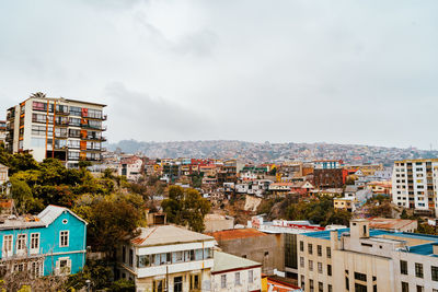 Buildings in city against sky