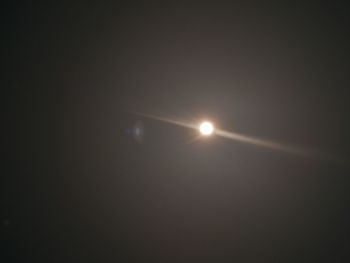 Low angle view of moon against sky