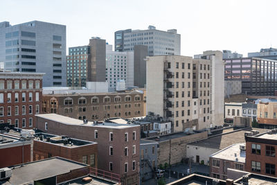 High angle view of buildings against clear sky