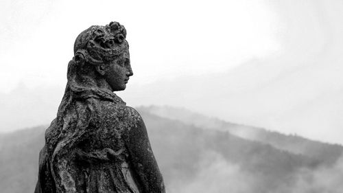 Low angle view of statue against sky