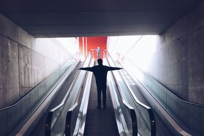 People standing in tunnel