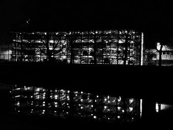 Illuminated buildings in city at night