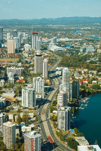 High angle view of modern buildings in city against sky