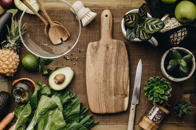 Directly above shot of vegetables by bowl on table